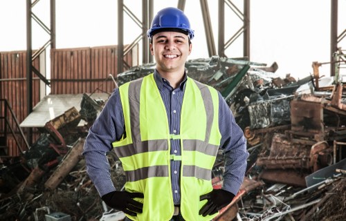 Professionals sorting items for clearance in Willesden